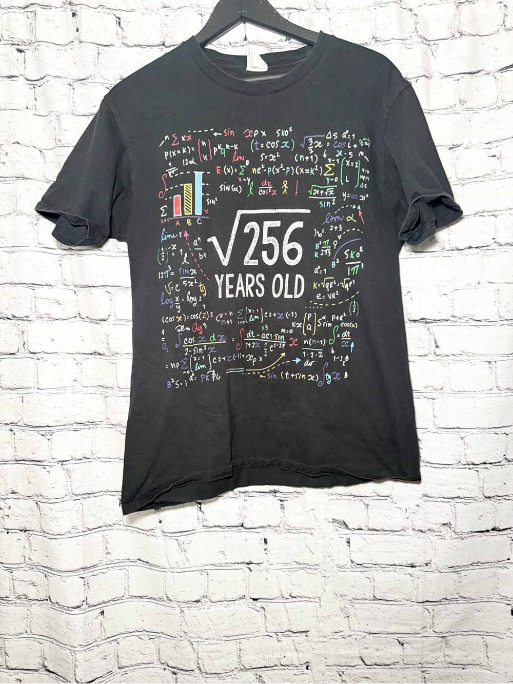 Black graphic tshirt. Size M